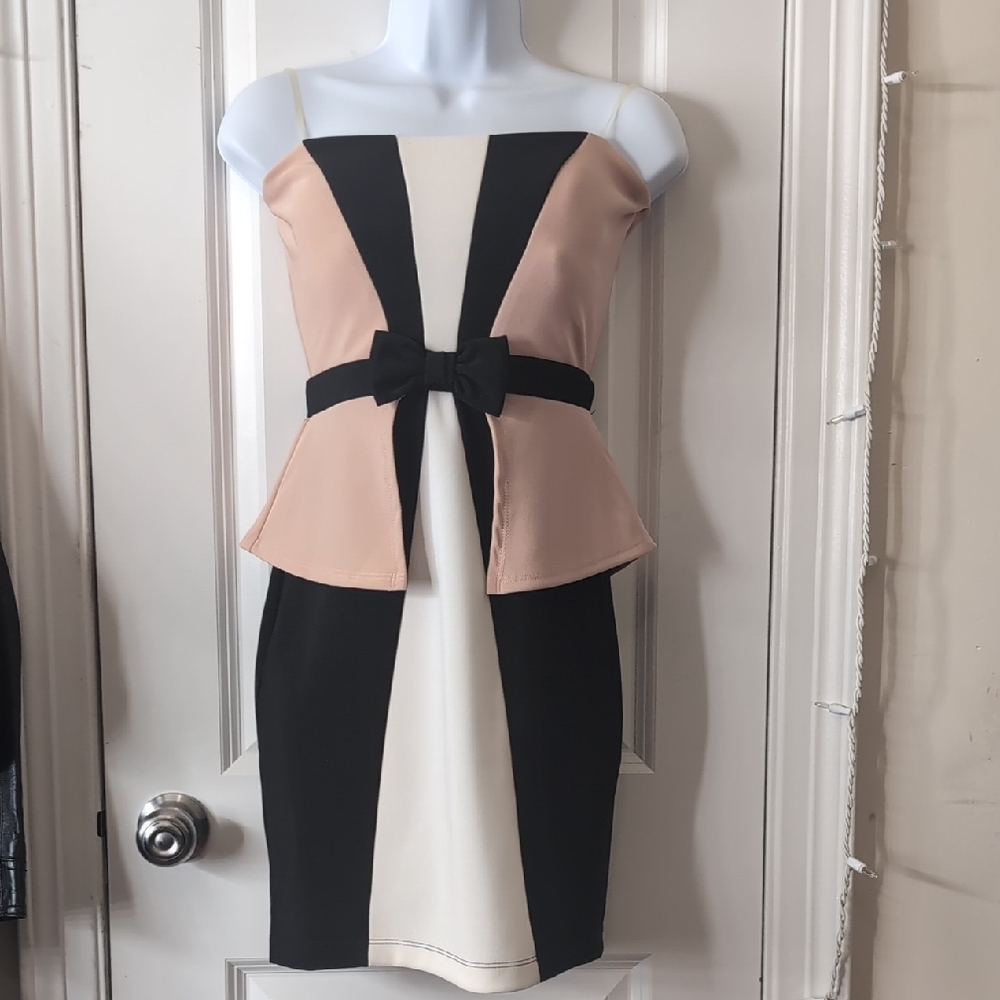 Elegant Black and Cream Dress with Bow Detail